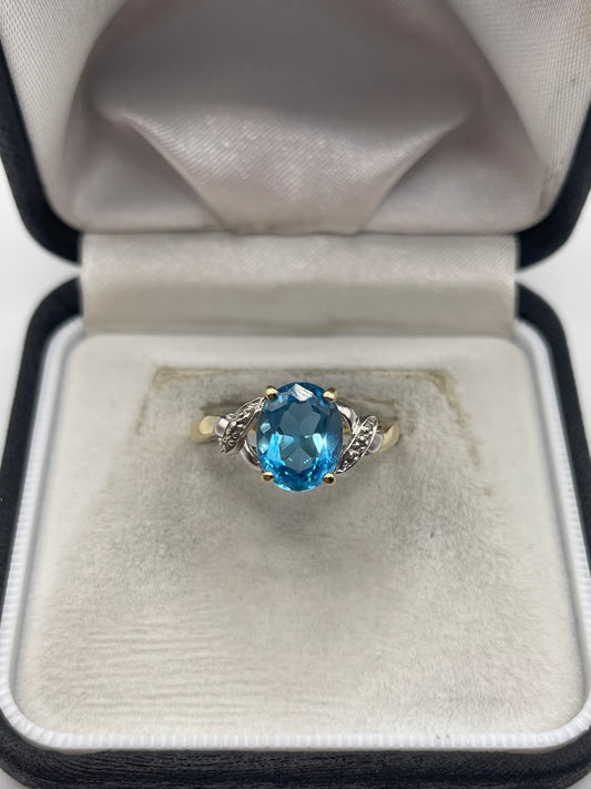9ct gold blue topaz and diamond ring