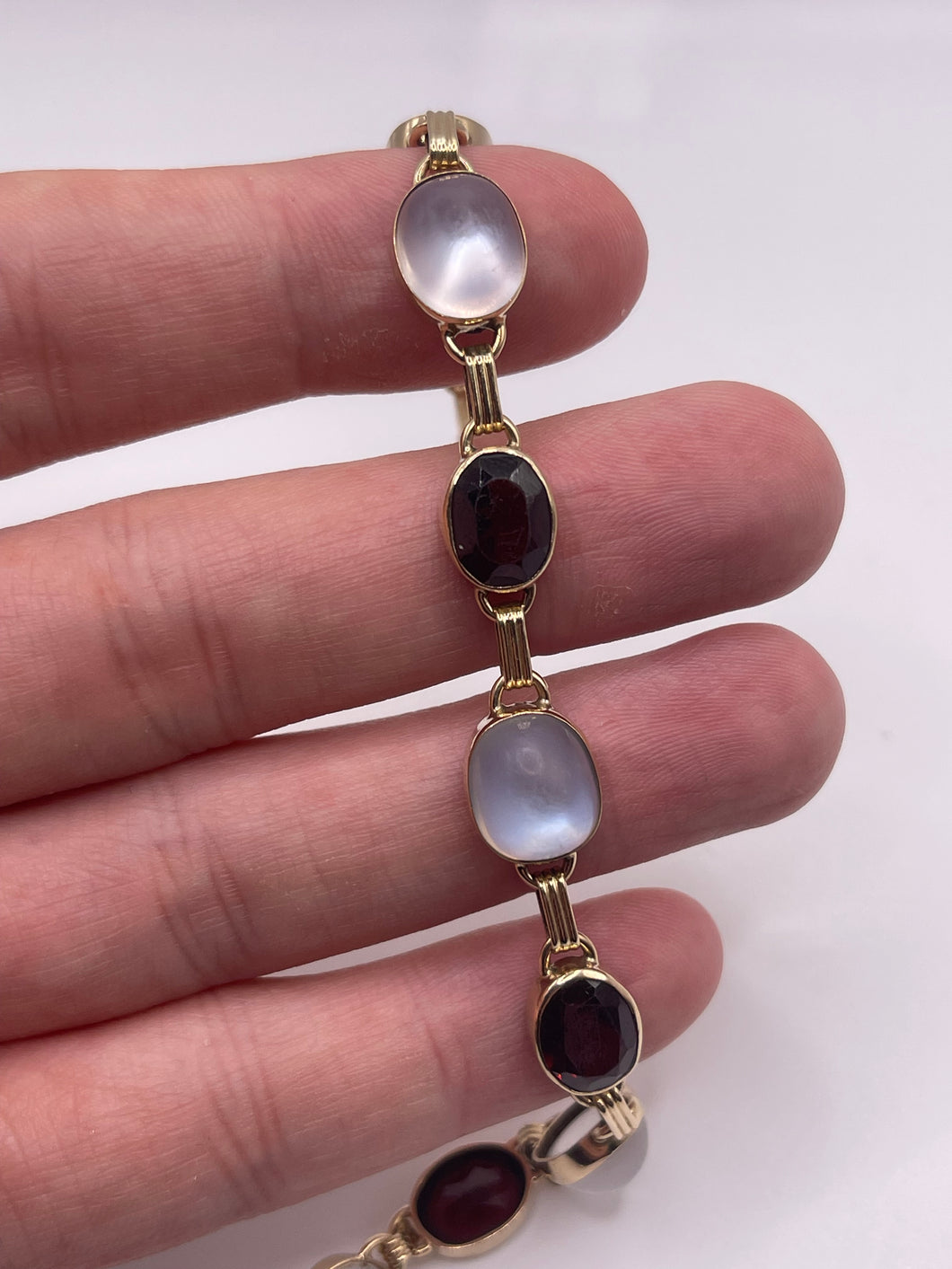 9ct gold moonstone and garnet bracelet