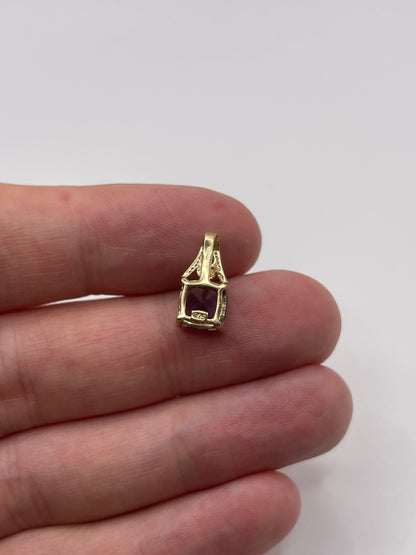 9ct gold iolite and diamond pendant