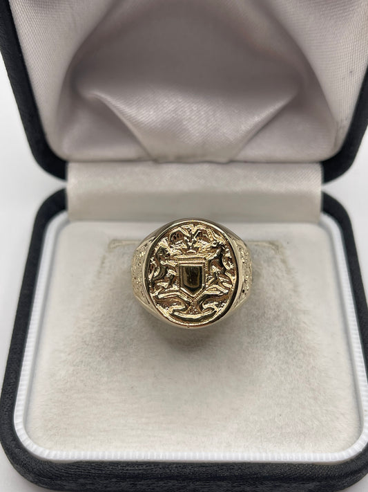 Heavy 9ct gold crest ring