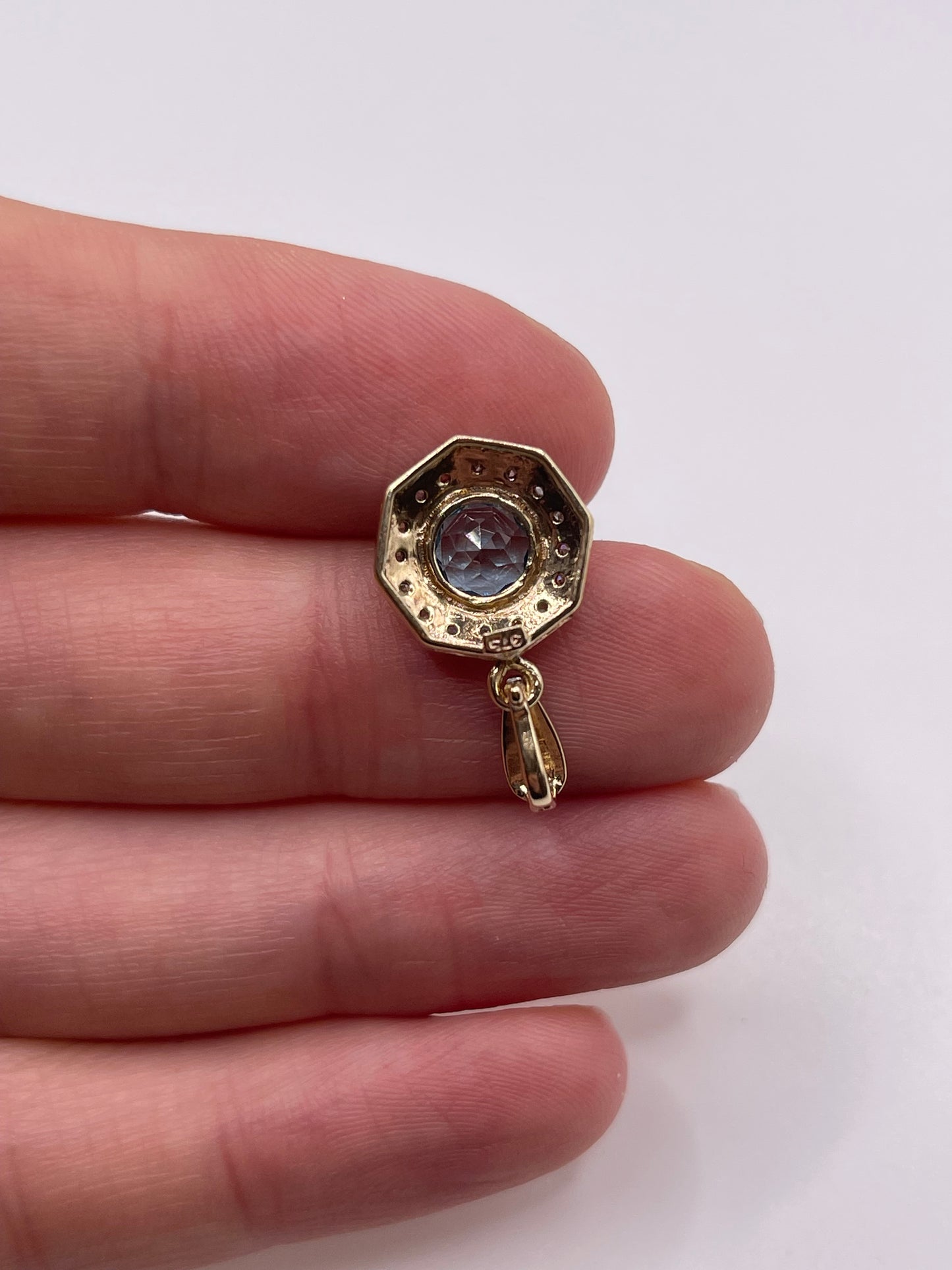 9ct gold topaz and diamond pendant