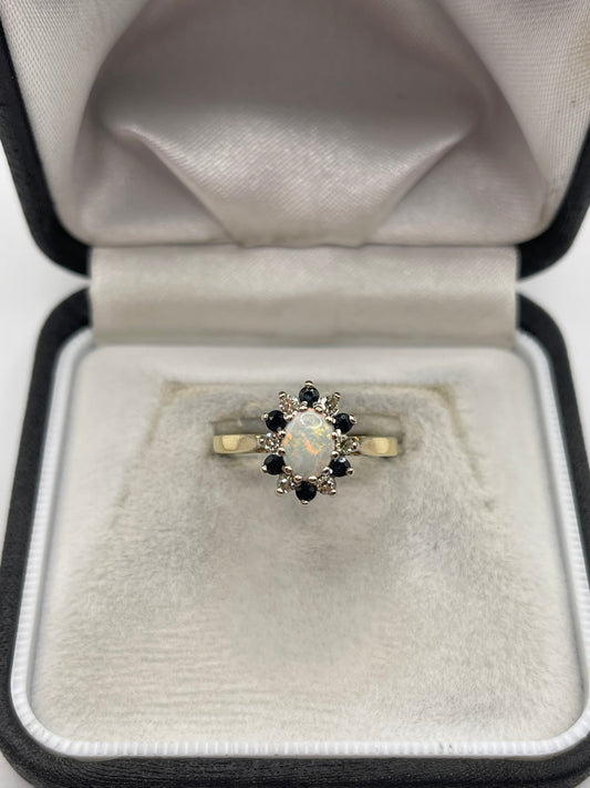 18ct gold opal, sapphire and diamond ring
