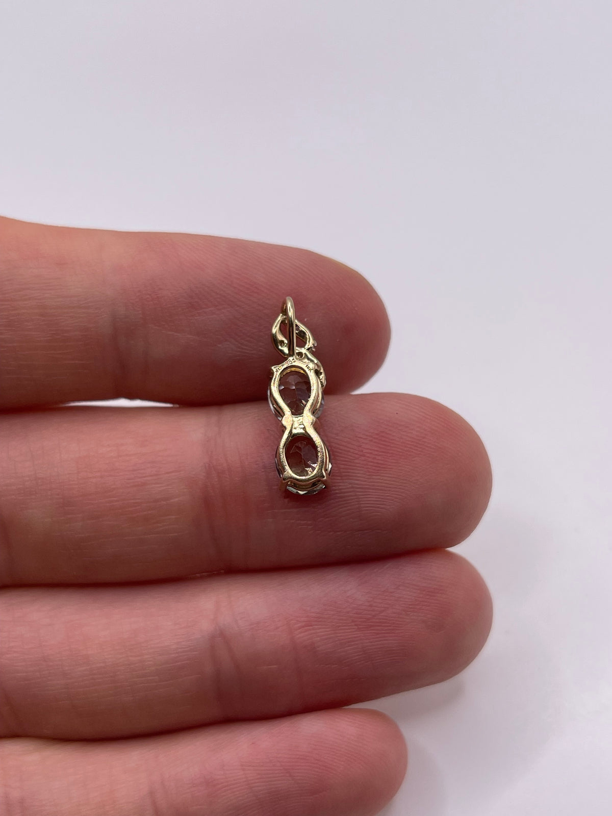 9ct gold tanzanite and diamond pendant