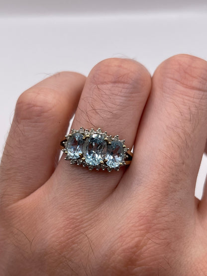 9ct gold blue topaz and diamond ring
