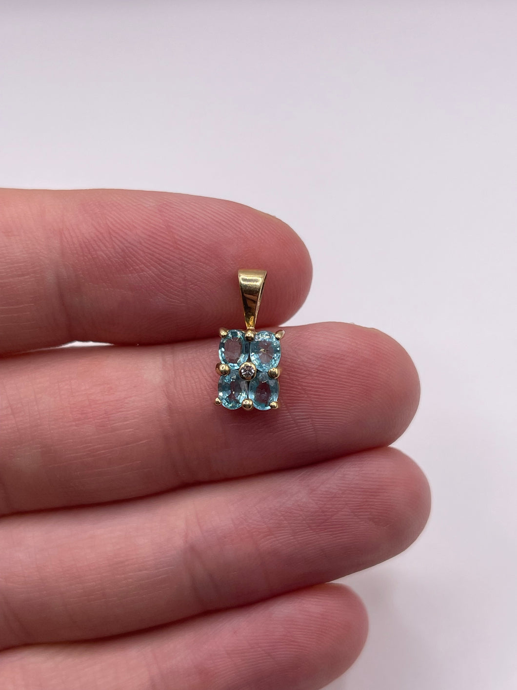 9ct gold topaz and diamond pendant