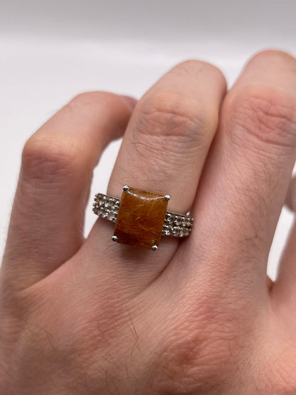 Silver rutile quartz and topaz ring