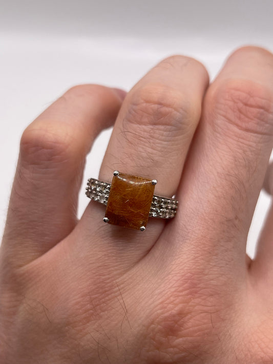 Silver rutile quartz and topaz ring