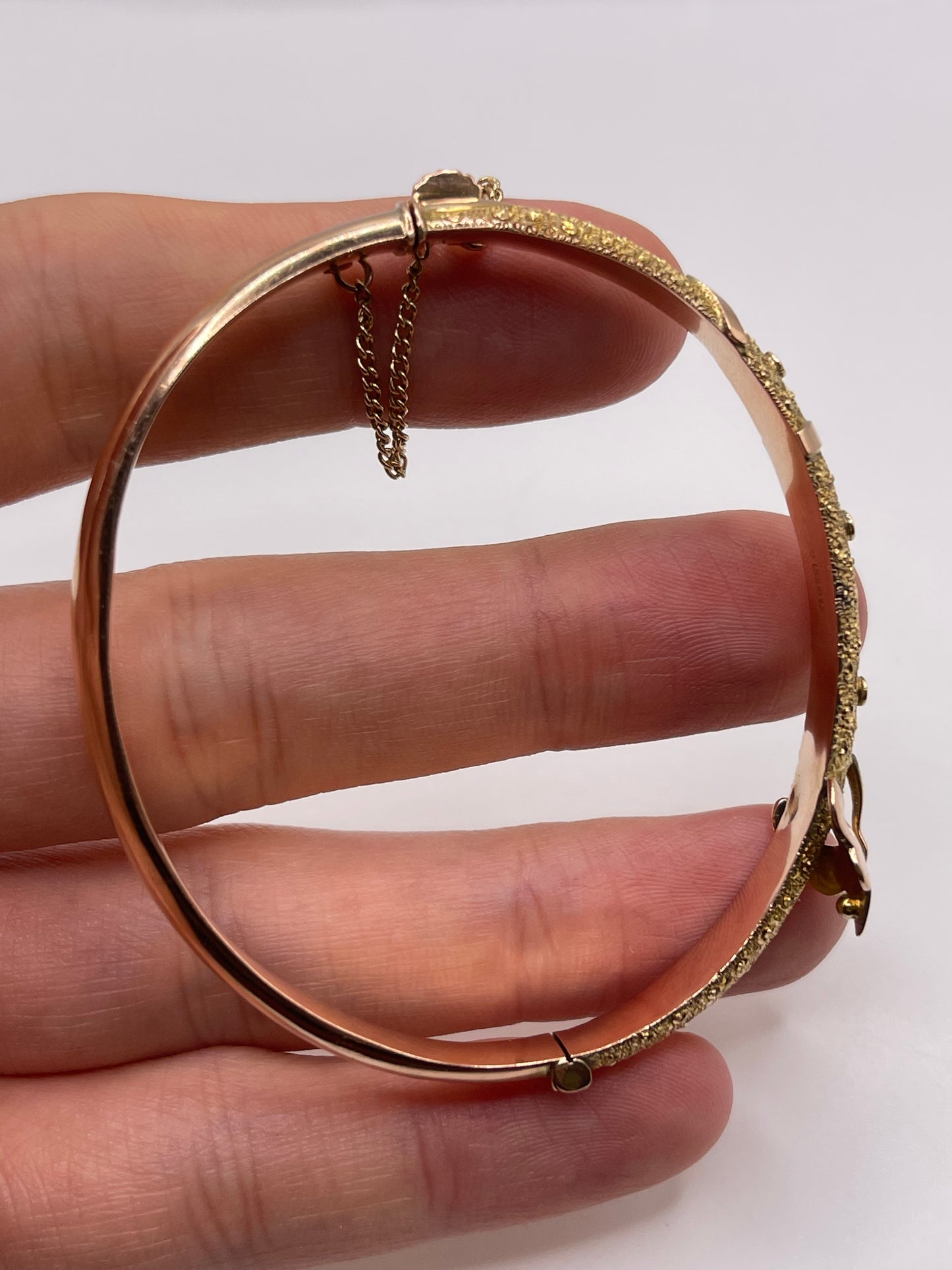 9ct rose gold buckle bangle