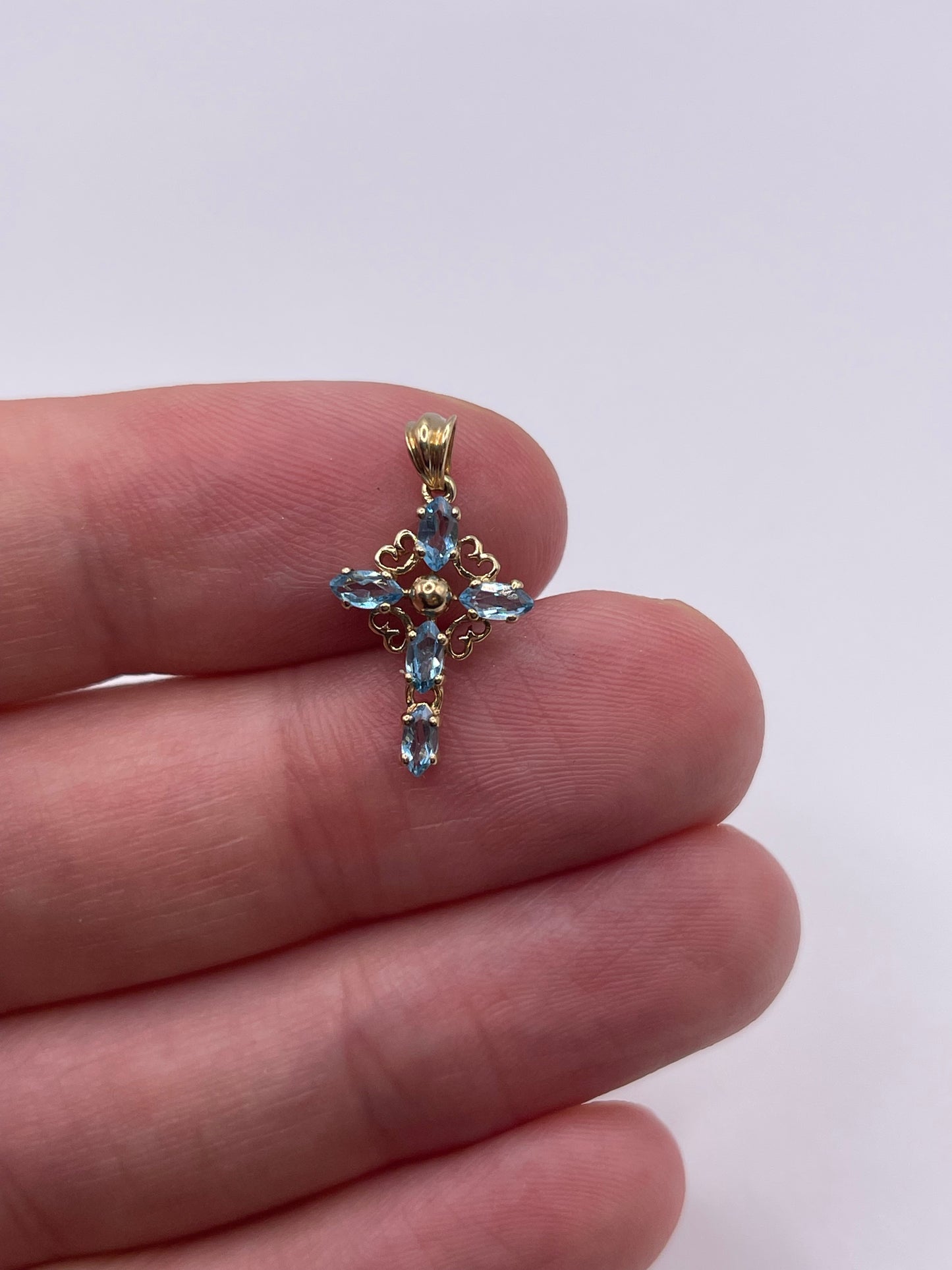 9ct gold blue topaz cross pendant