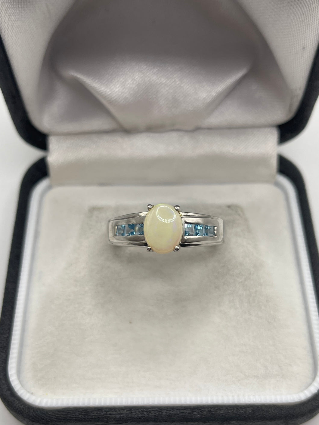 Silver opal and topaz ring