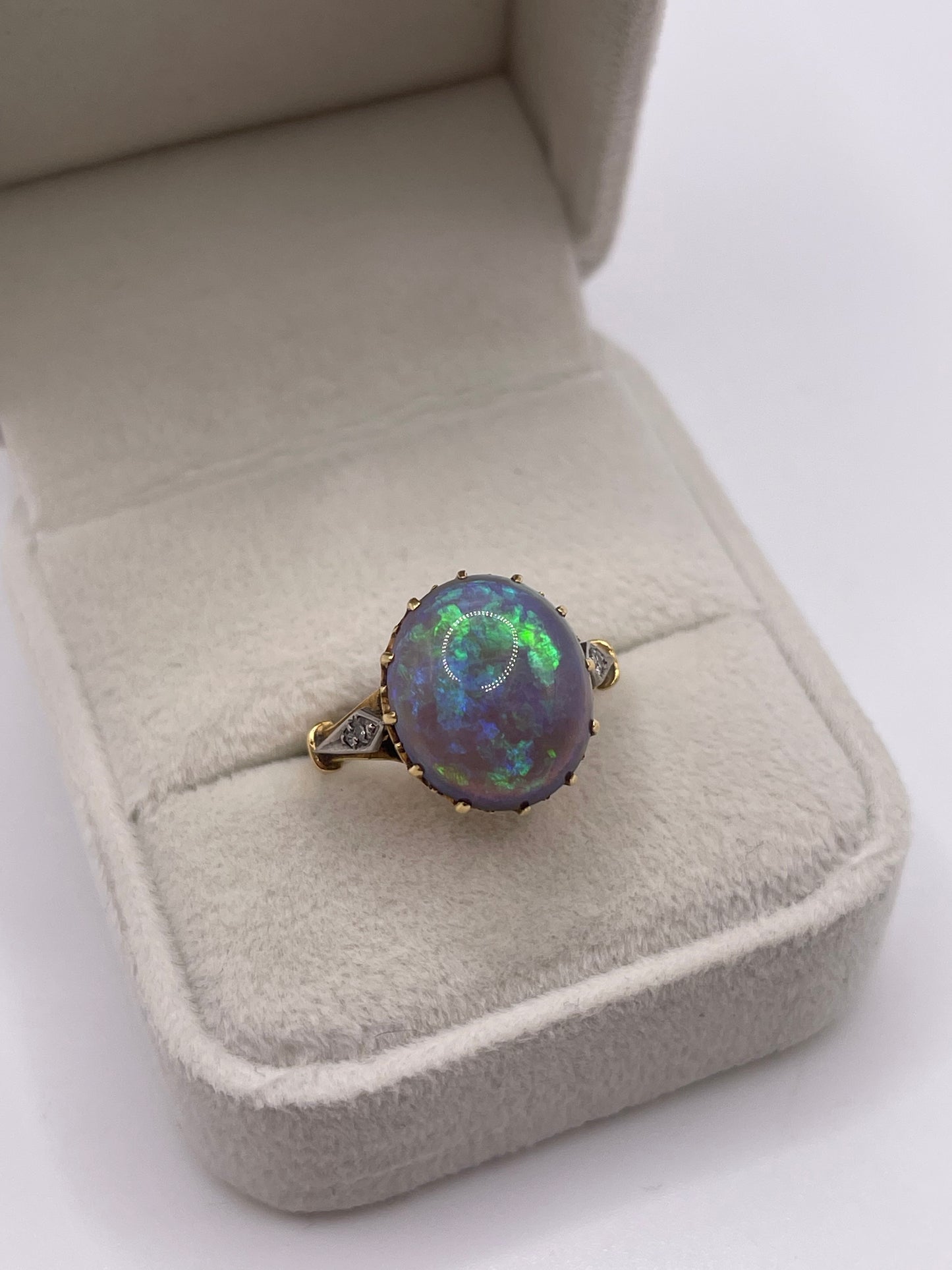 18ct gold solid black opal and diamond ring