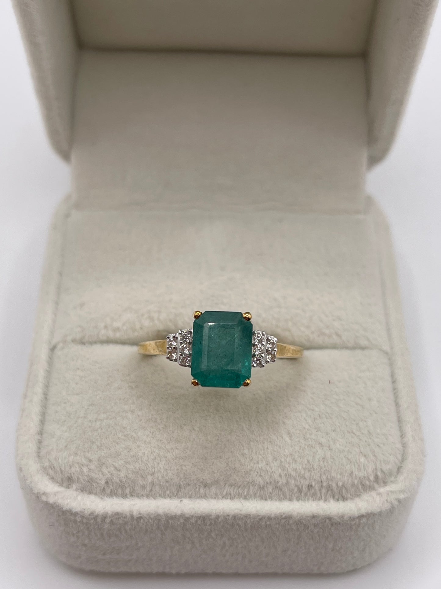 9ct gold emerald and zircon ring