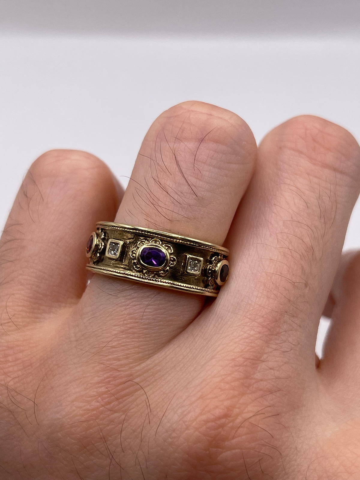 9ct gold garnet, amethyst, sapphire and diamond ring