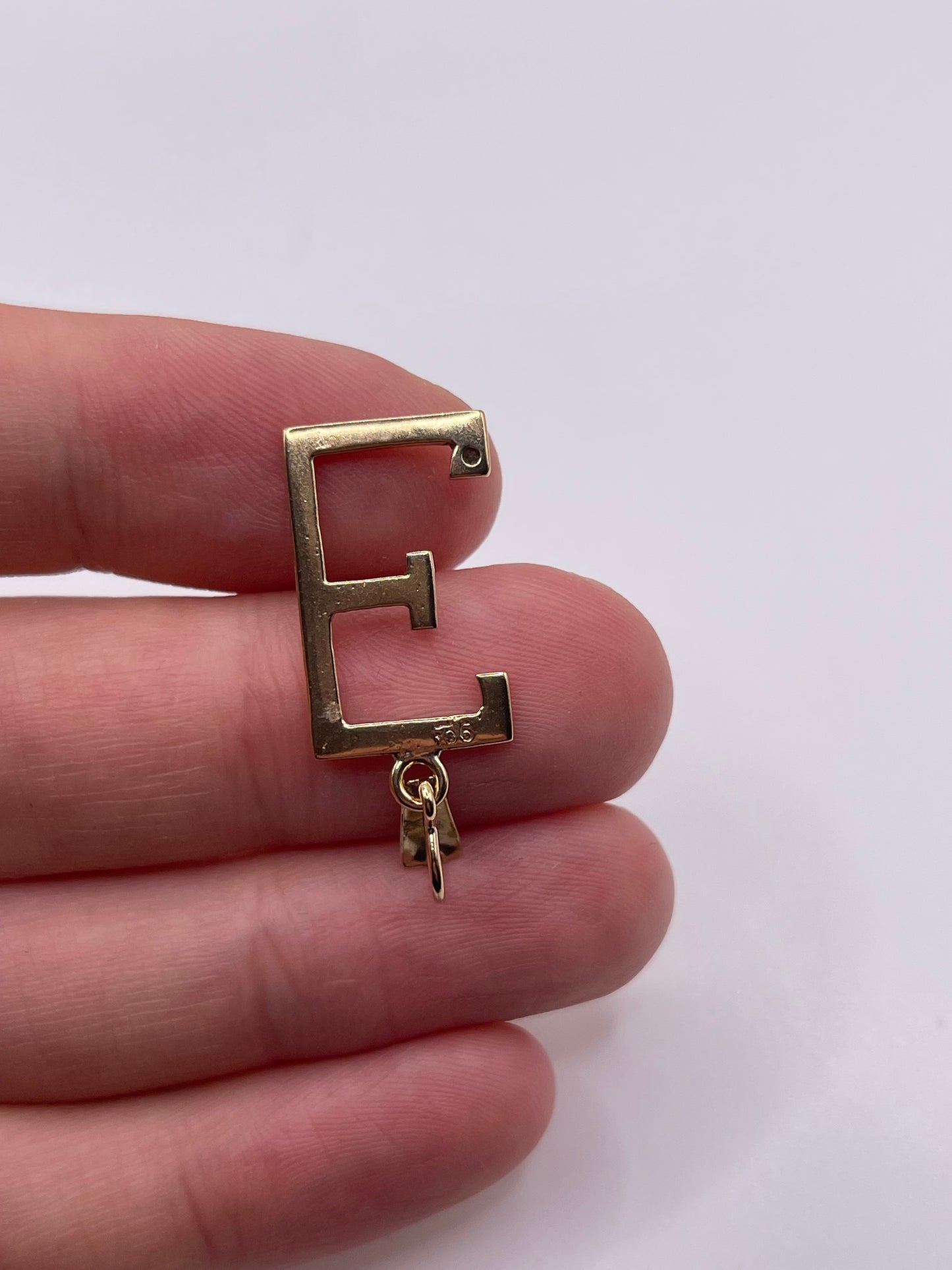 9ct gold garnet initial E pendant