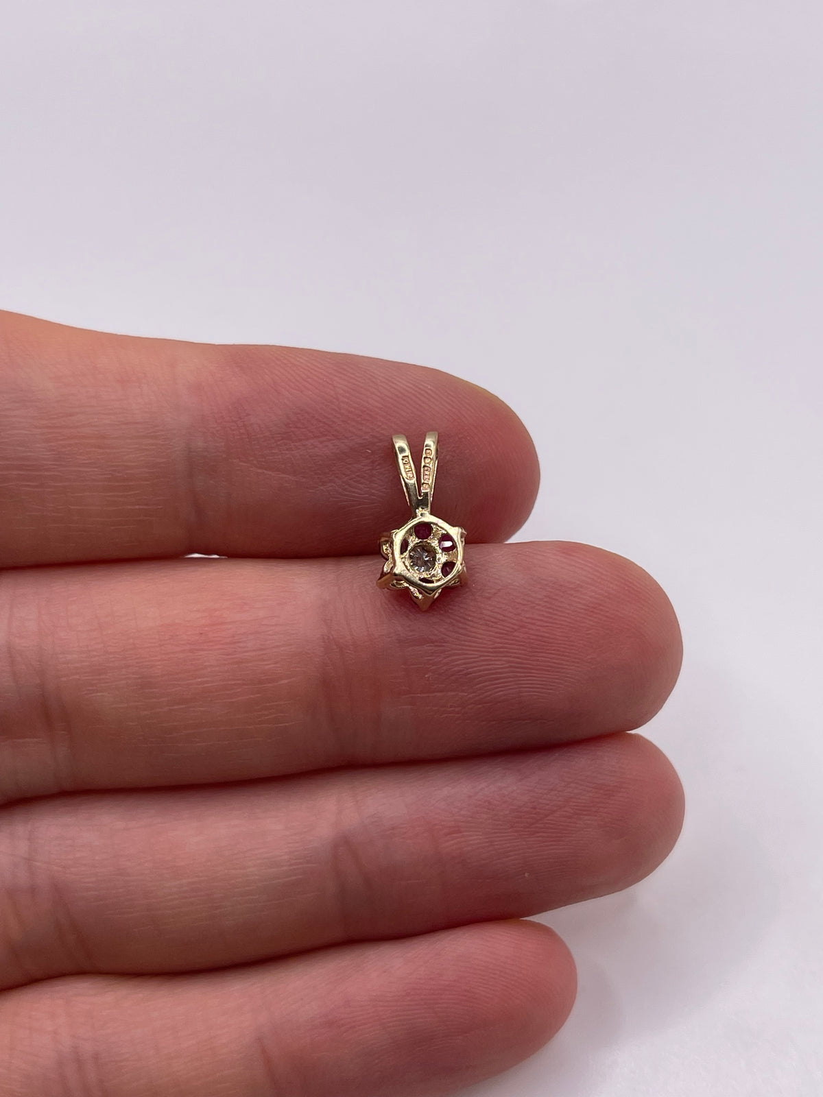 9ct gold ruby and diamond pendant