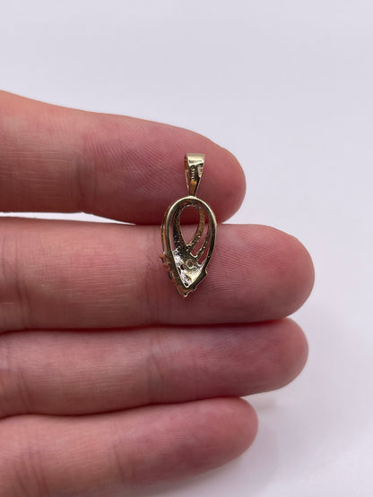 9ct gold emerald and diamond pendant