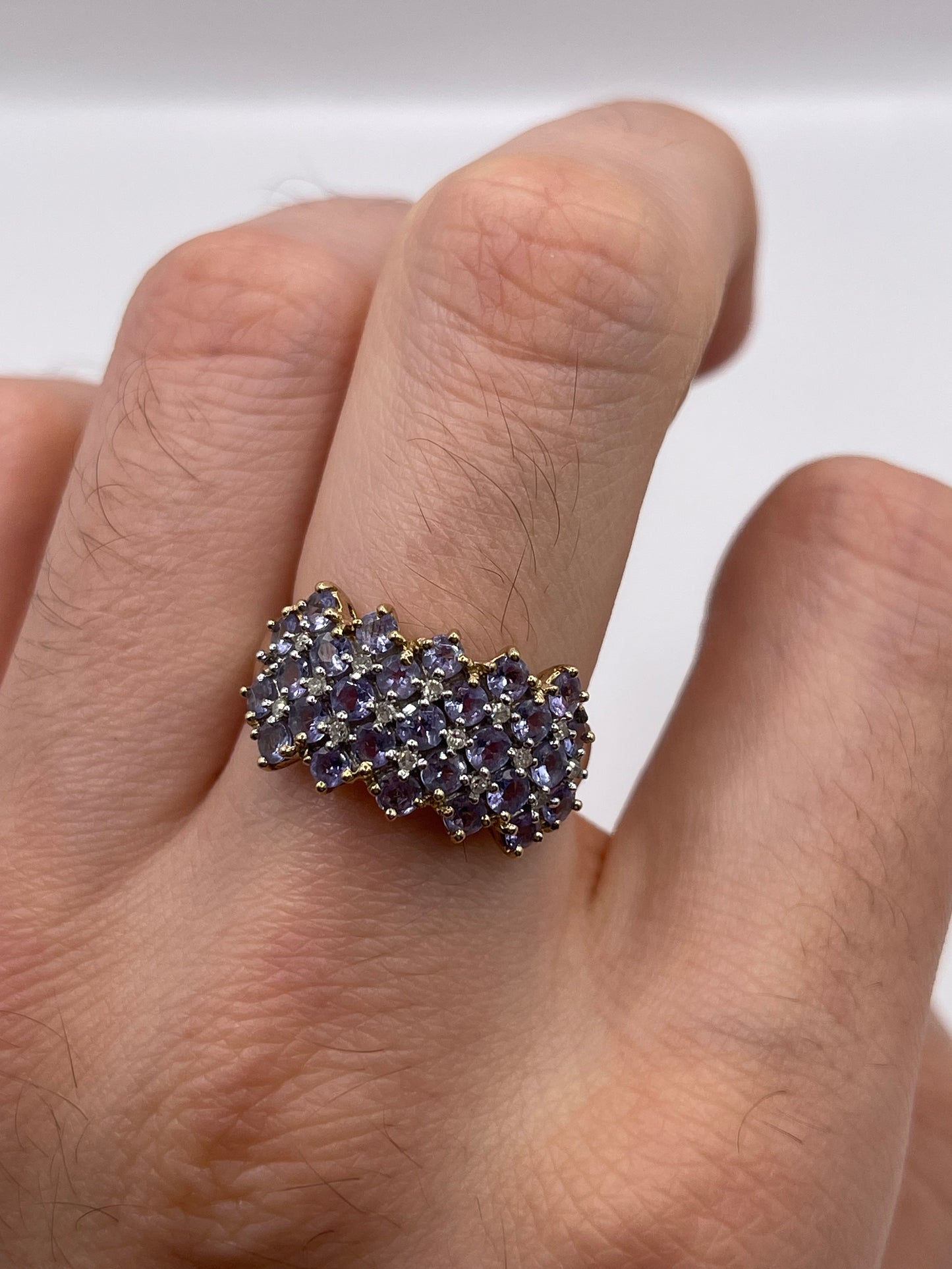 9ct gokd tanzanite and diamond cluster ring