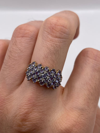 9ct gokd tanzanite and diamond cluster ring