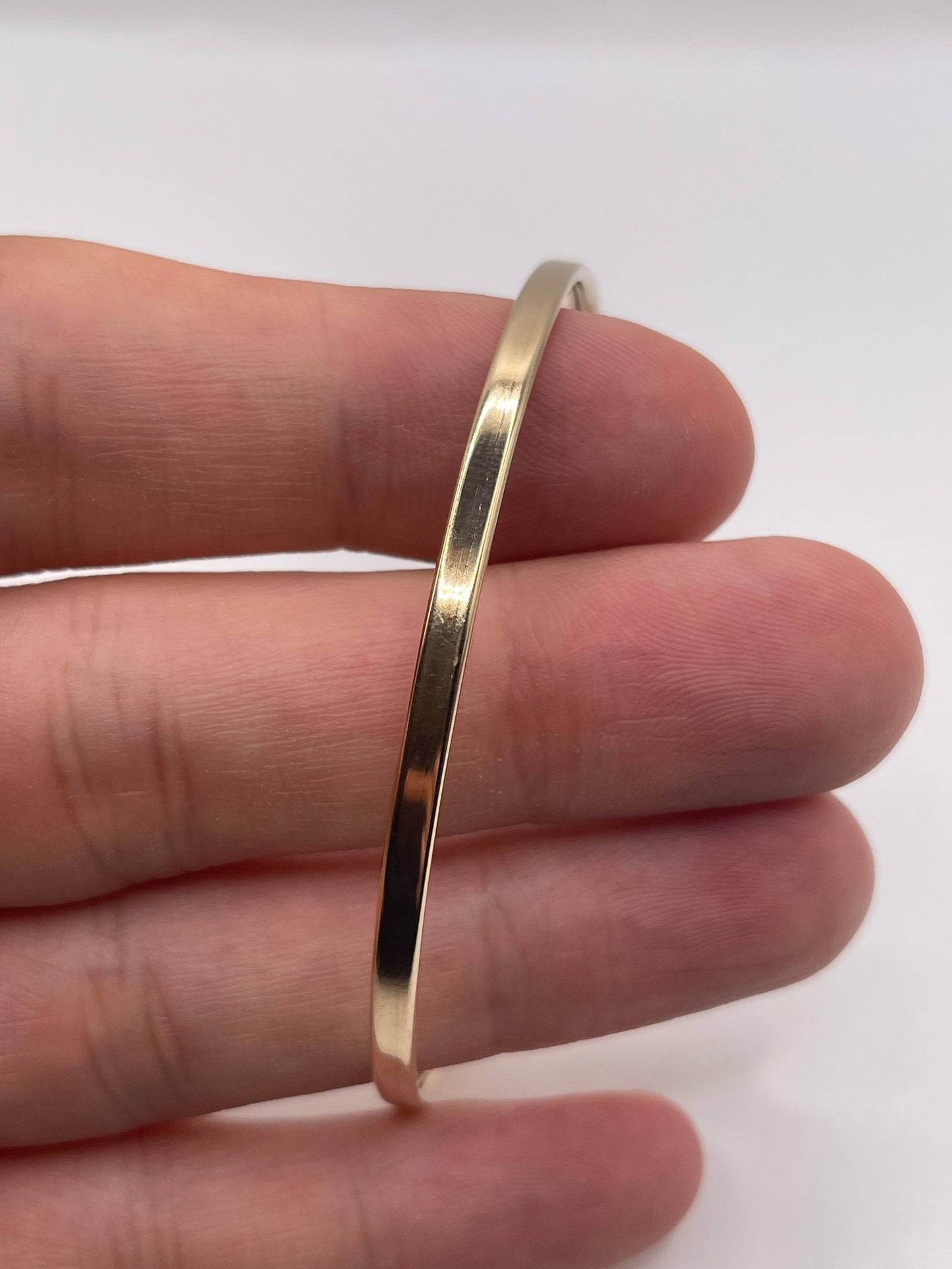 9ct gold garnet snake bangle