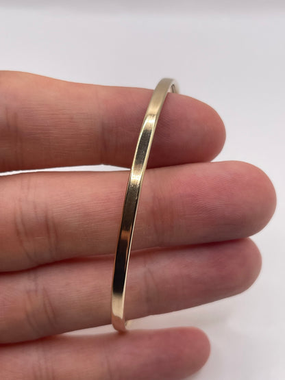 9ct gold garnet snake bangle