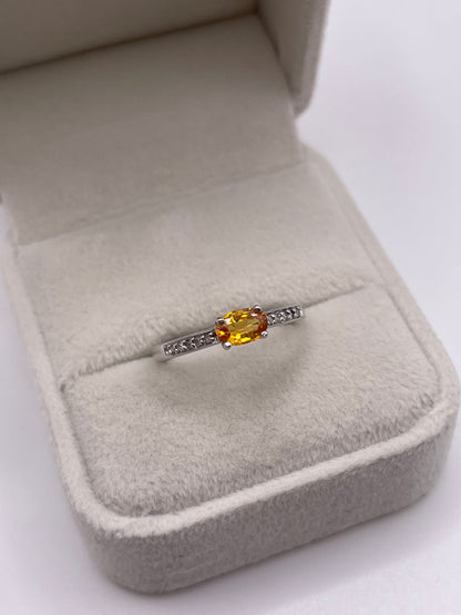 9ct white gold orange sapphire and diamond ring