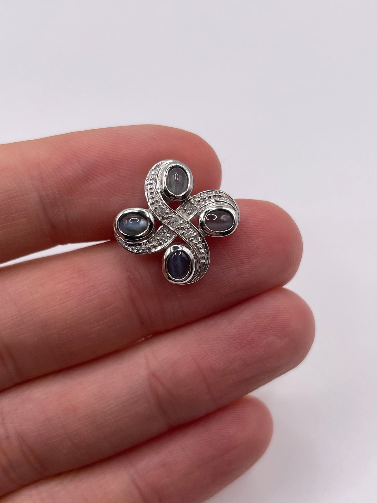 9ct white gold cats eye and diamond pendant