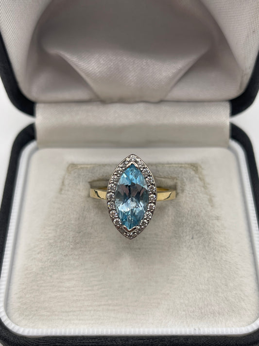 18ct gold topaz and diamond ring
