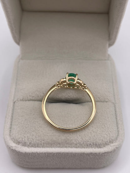 9ct gold emerald and zircon ring