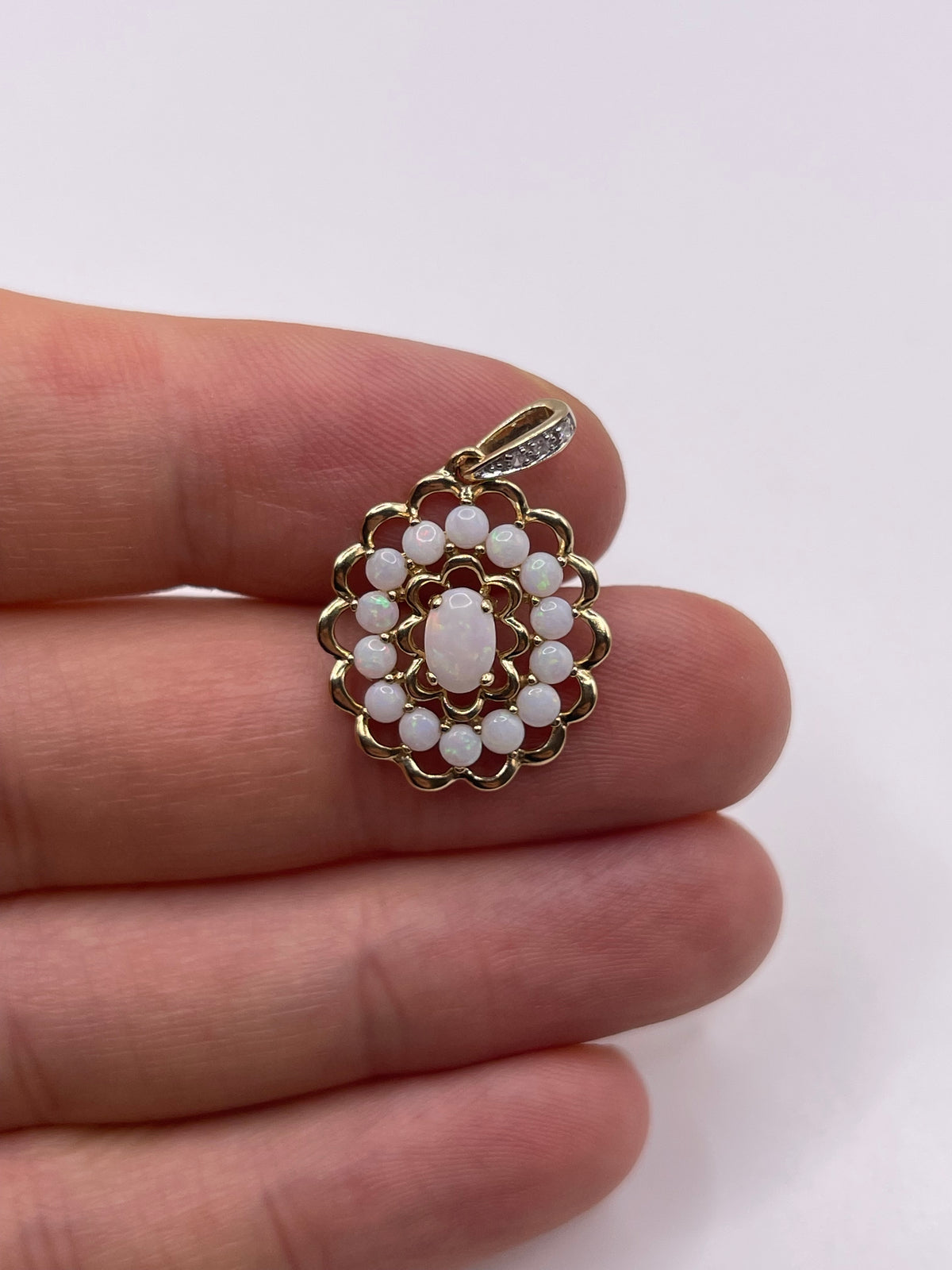 9ct gold opal and diamond pendant