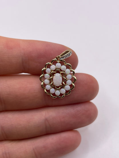 9ct gold opal and diamond pendant