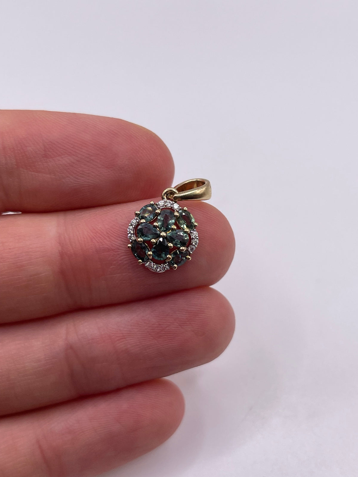9ct gold alexandrite and zircon pendant