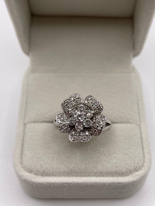 Heavy 18ct white gold diamond cluster ring