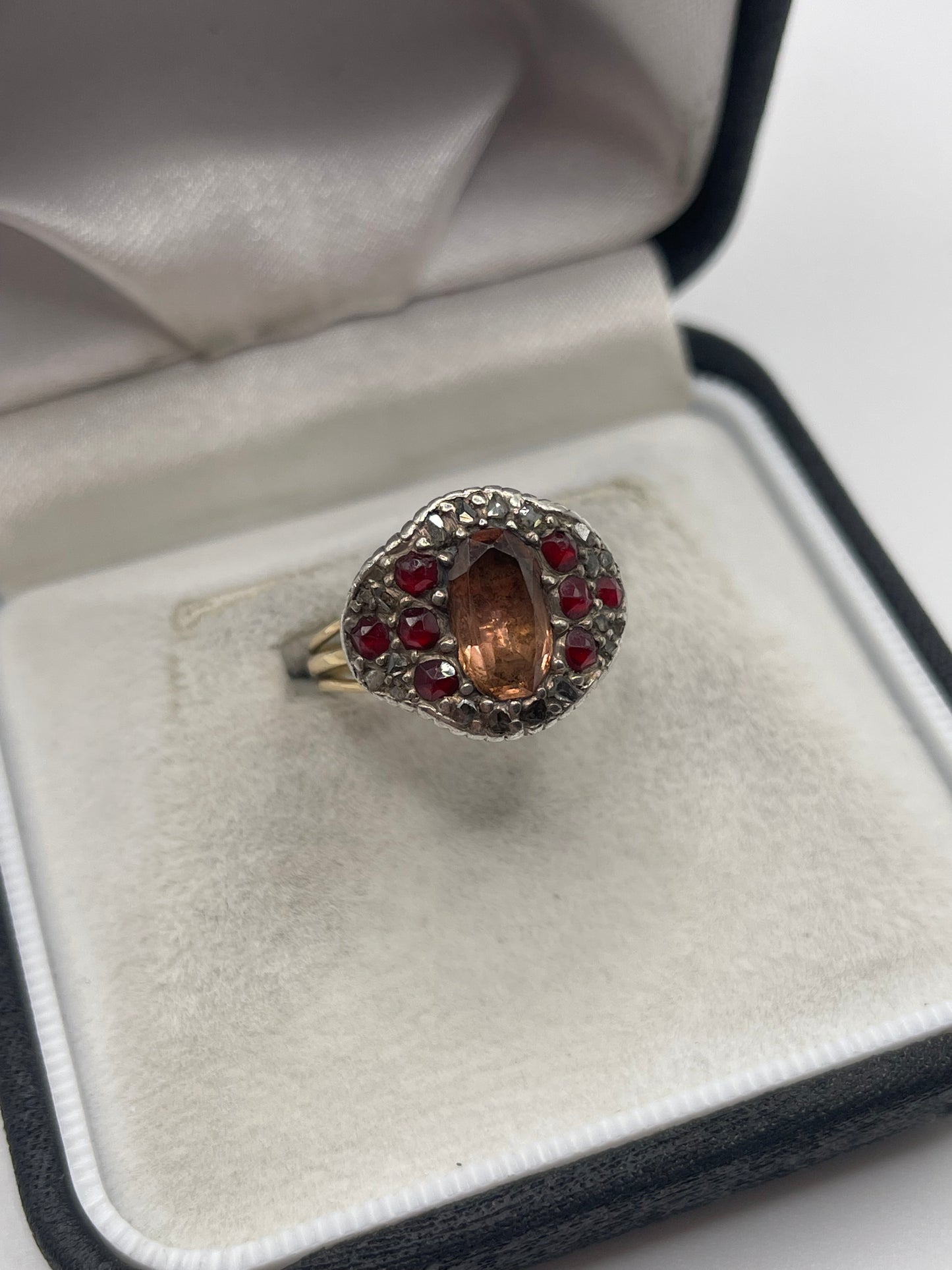 9ct gold and silver topaz, garnet and diamond ring