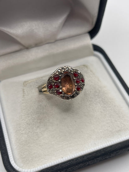 9ct gold and silver topaz, garnet and diamond ring
