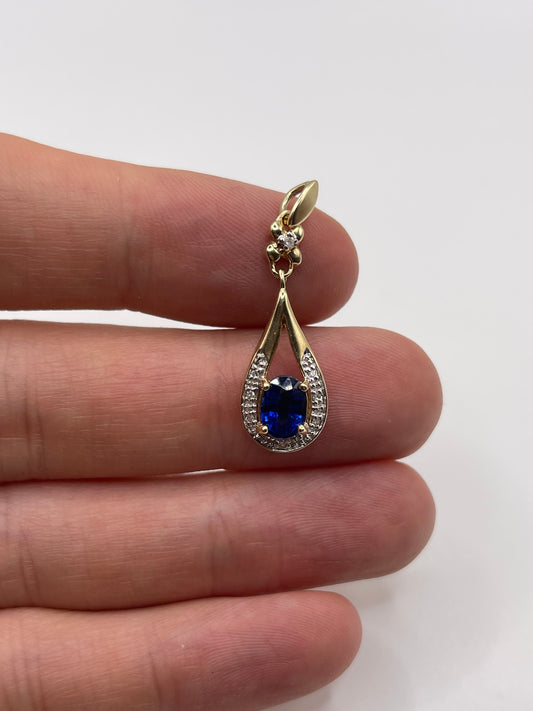 9ct gold kyanite and diamond pendant