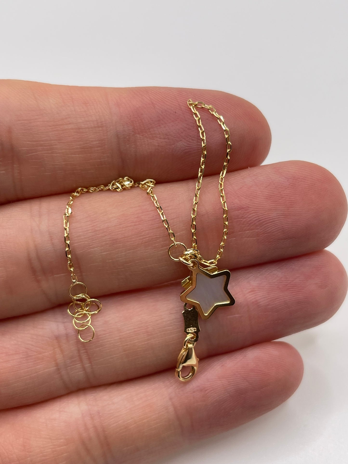 9ct gold mother of pearl star bracelet
