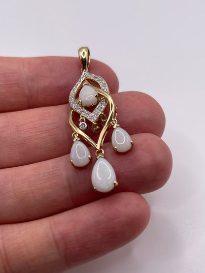 9ct gold opal and diamond pendant