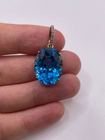 9ct gold blue topaz and diamond pendant