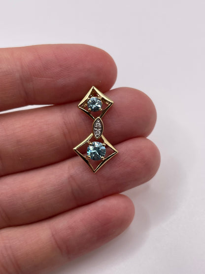 9ct gold blue zircon and diamond pendant