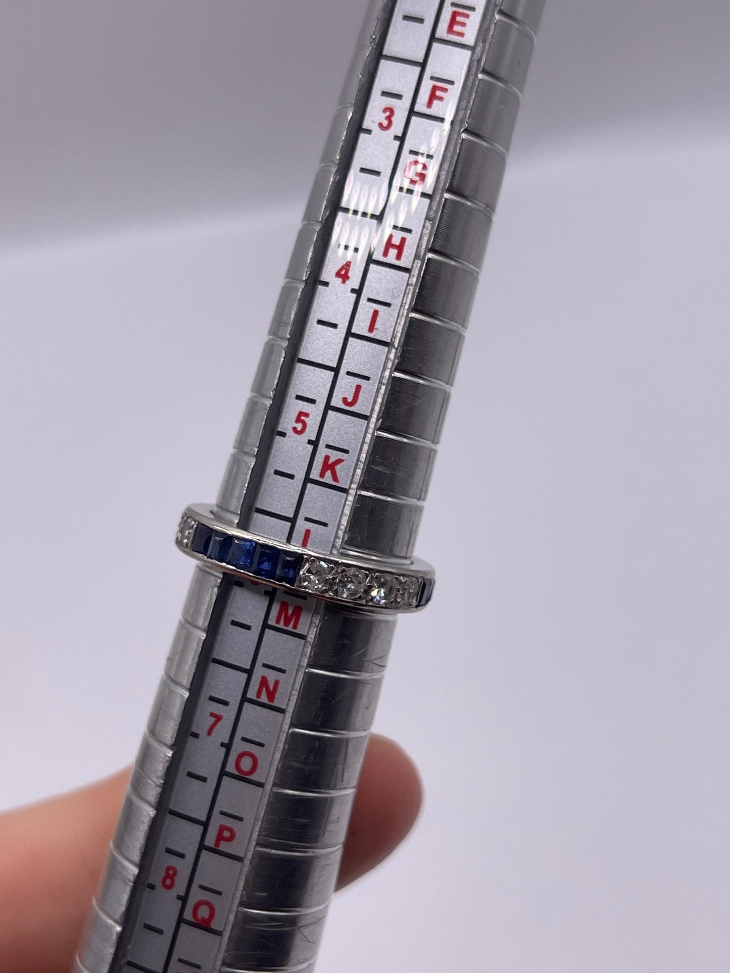 Platinum sapphire and diamond full eternity ring