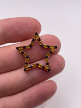 Load image into Gallery viewer, 9ct gold garnet and citrine star pendant
