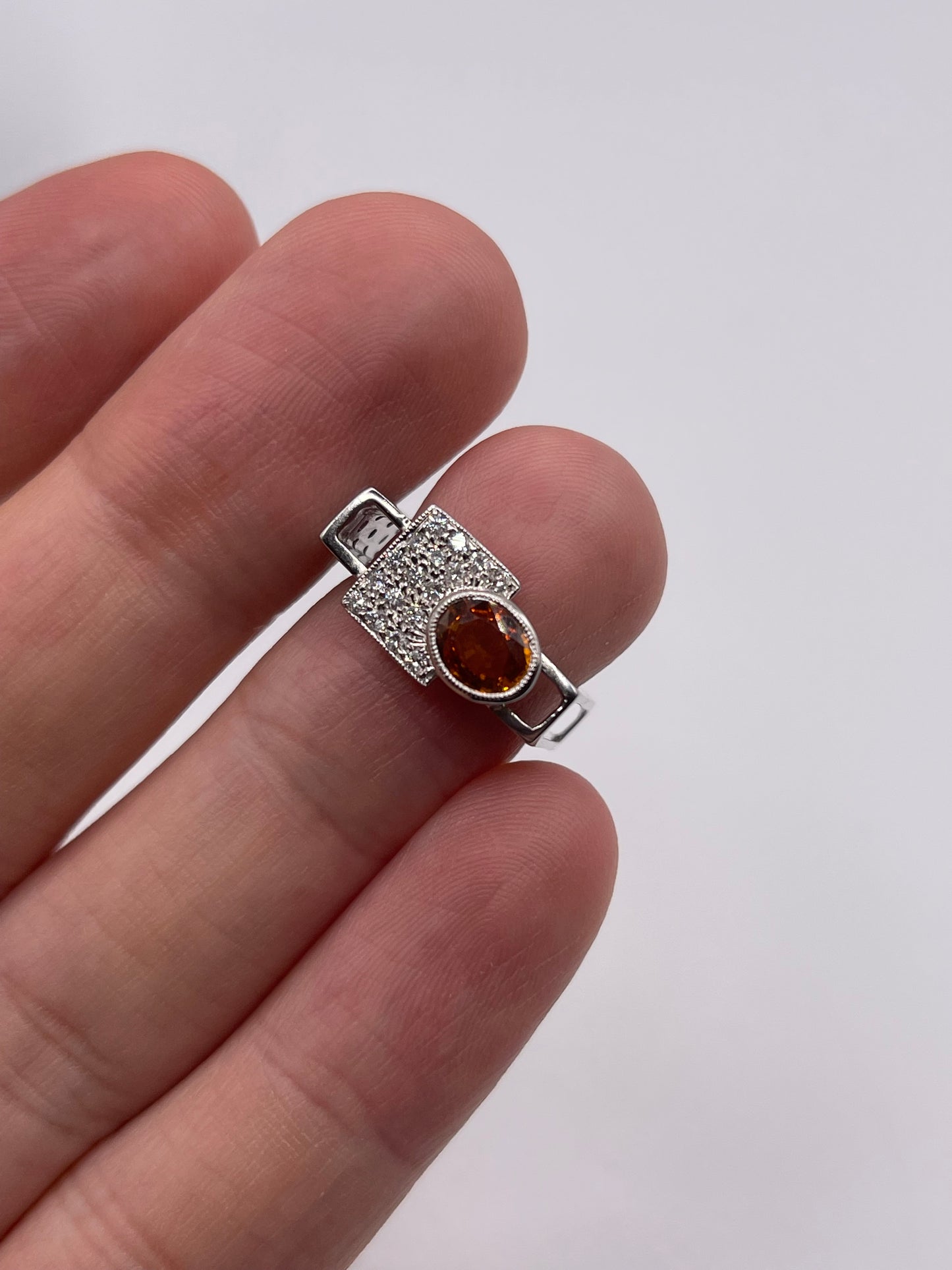 18ct white gold orange sapphire and diamond ring