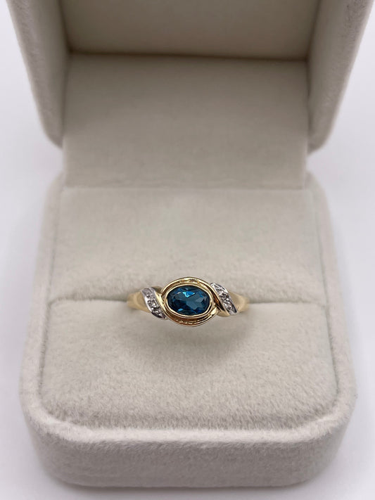 9ct gold topaz and diamond ring