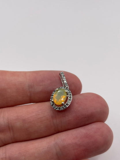 9ct white gold opal and alexandrite pendant