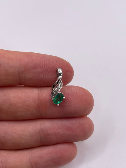 9ct white gold emerald and diamond pendant