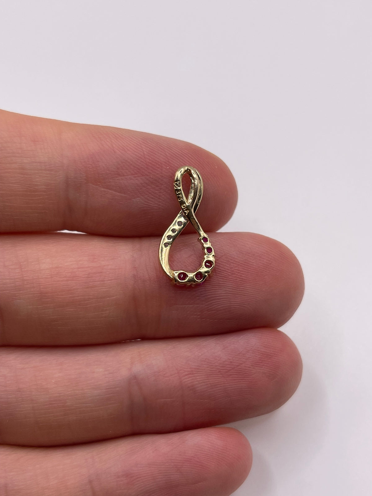 9ct gold ruby and diamond pendant