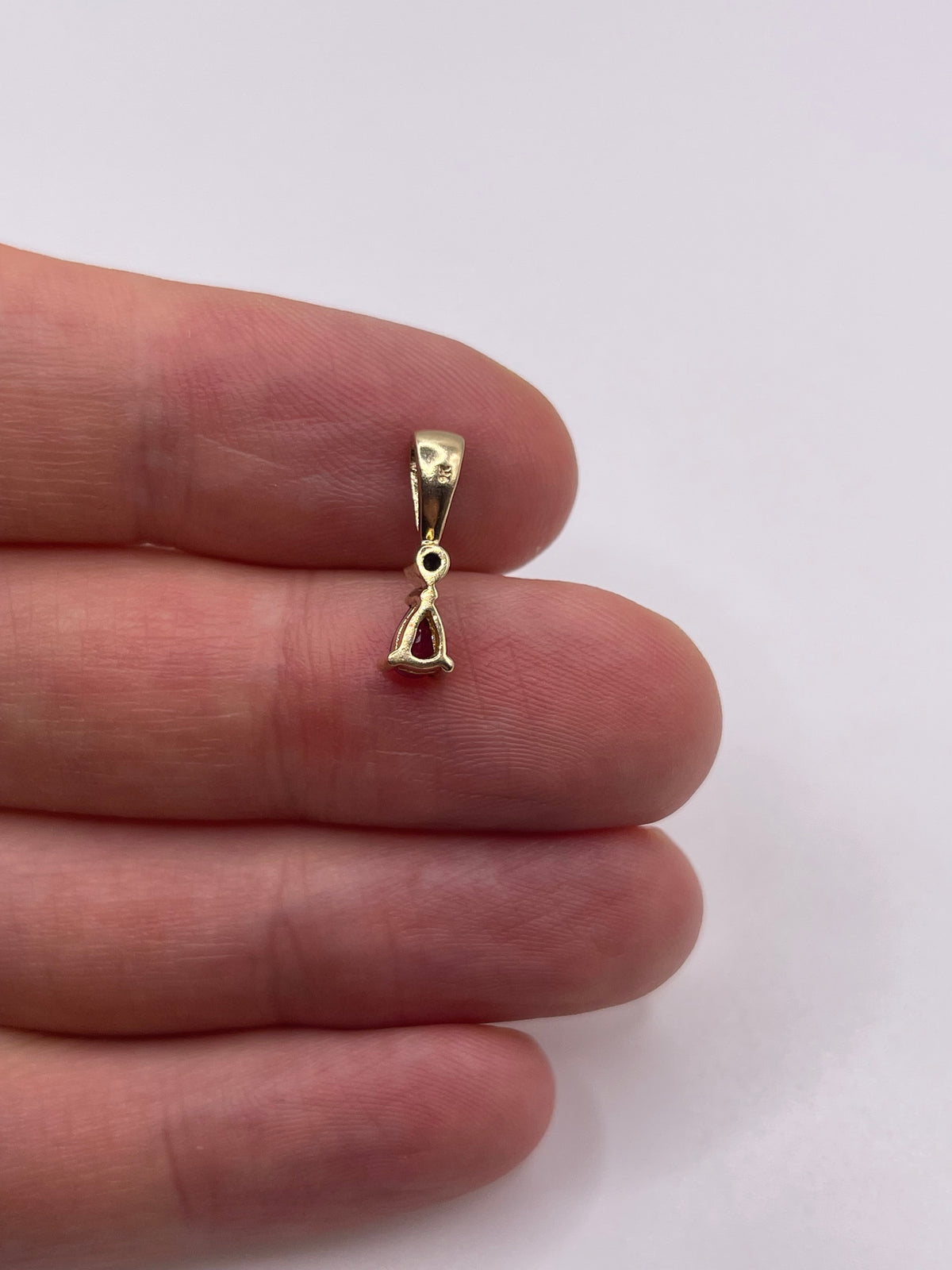 9ct gold ruby and diamond pendant