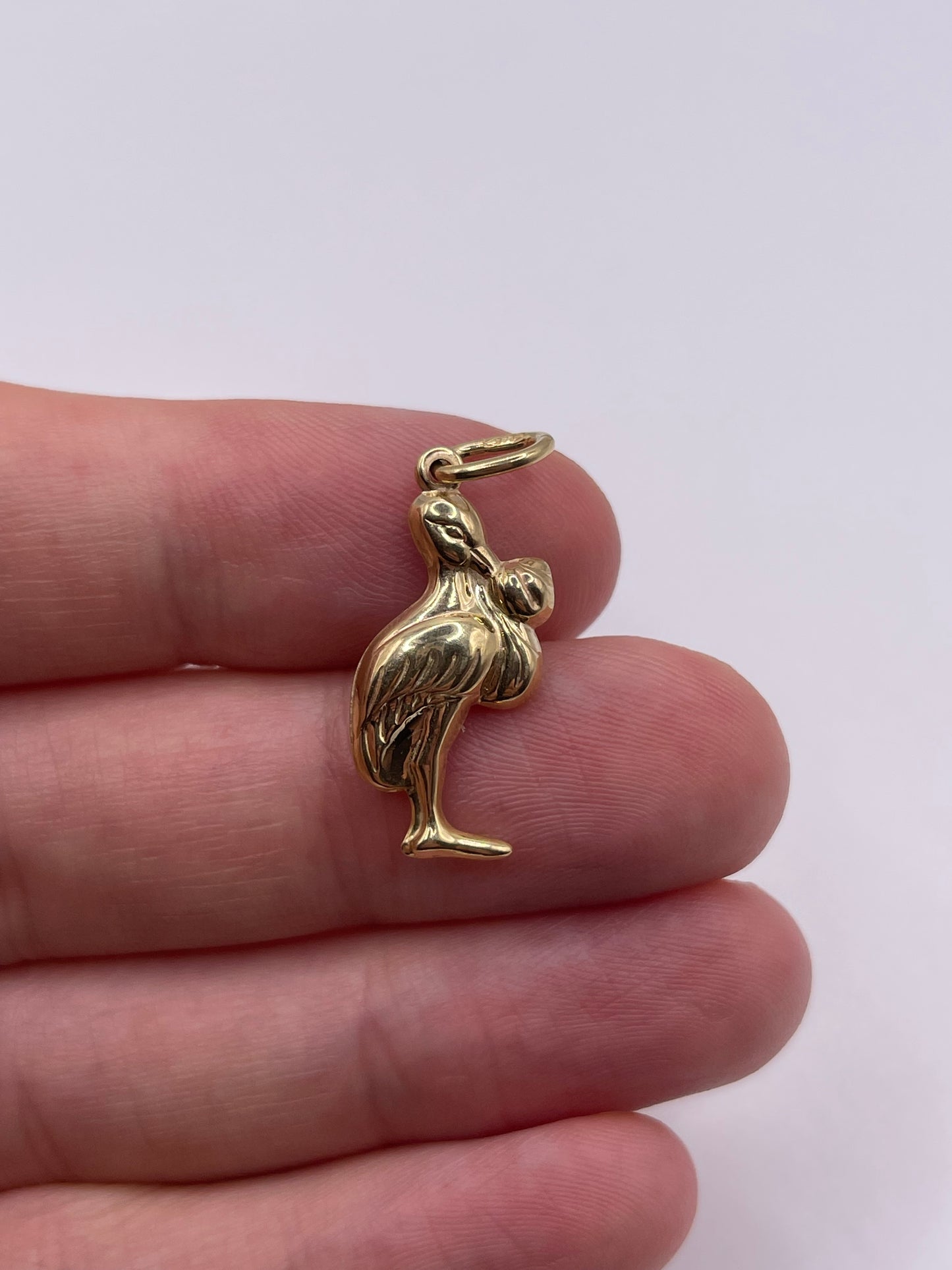 9ct gold stork and baby charm