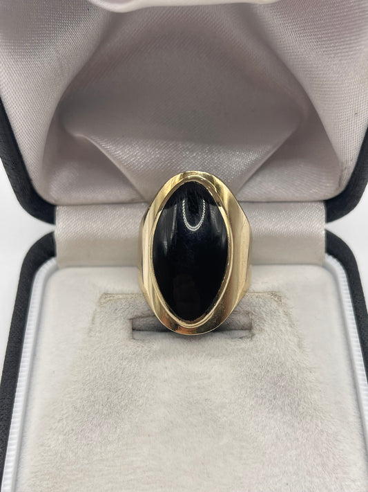 Heavy 9ct gold onyx ring