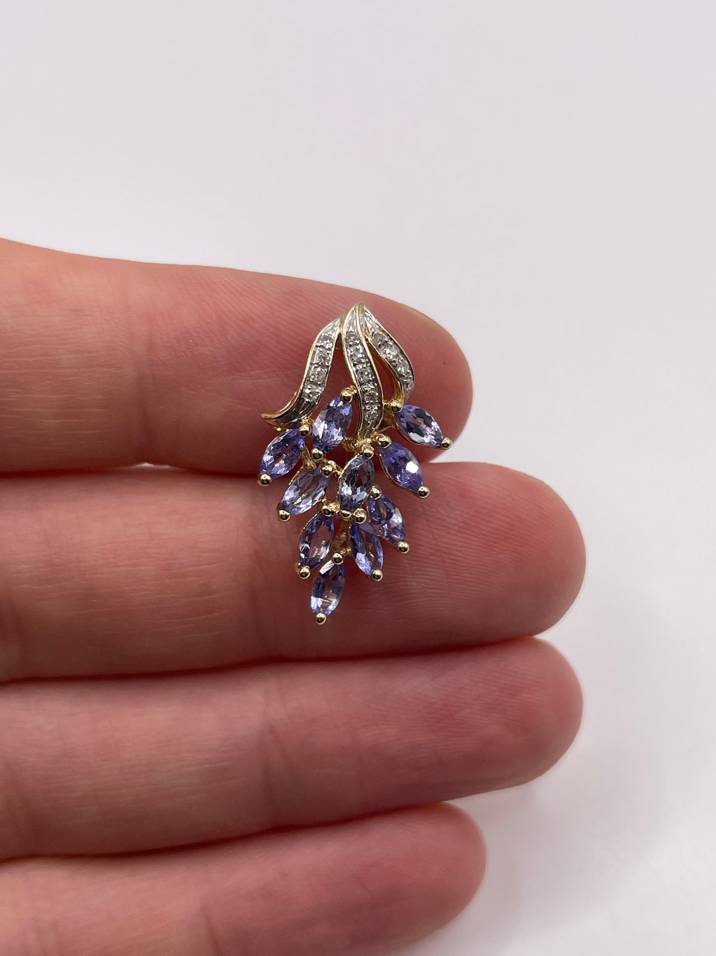 9ct gold tanzanite and diamond pendant